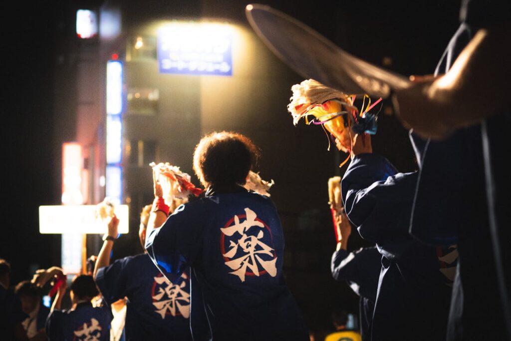 People performing in a japanese local festival